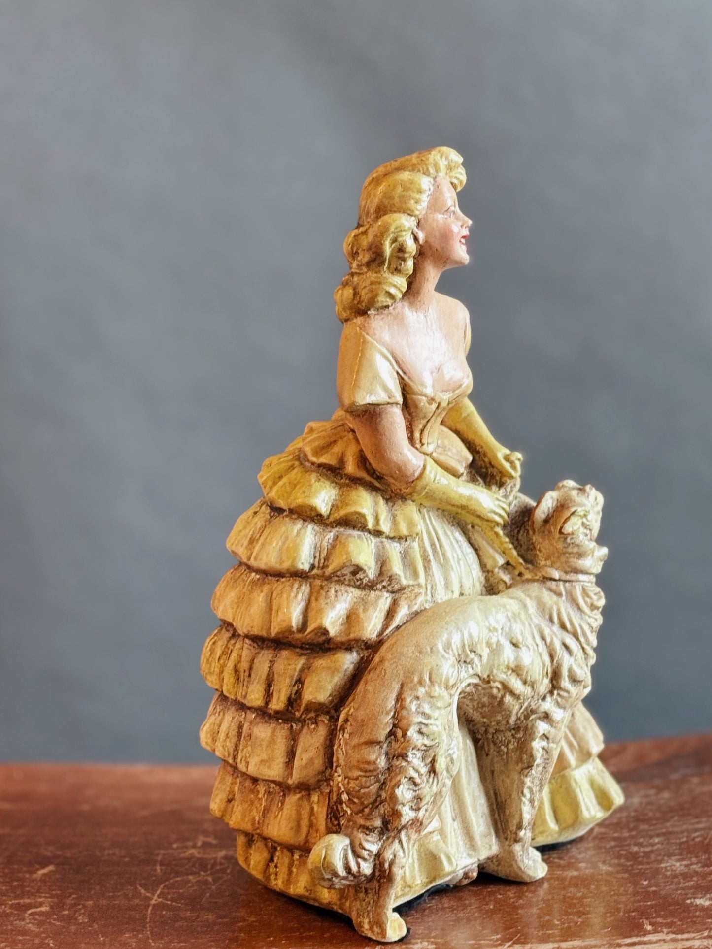 Woman with Dog Statuette