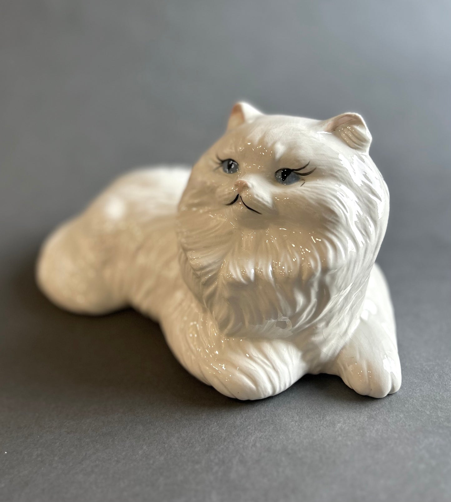 Porcelain Laying Cat Statue