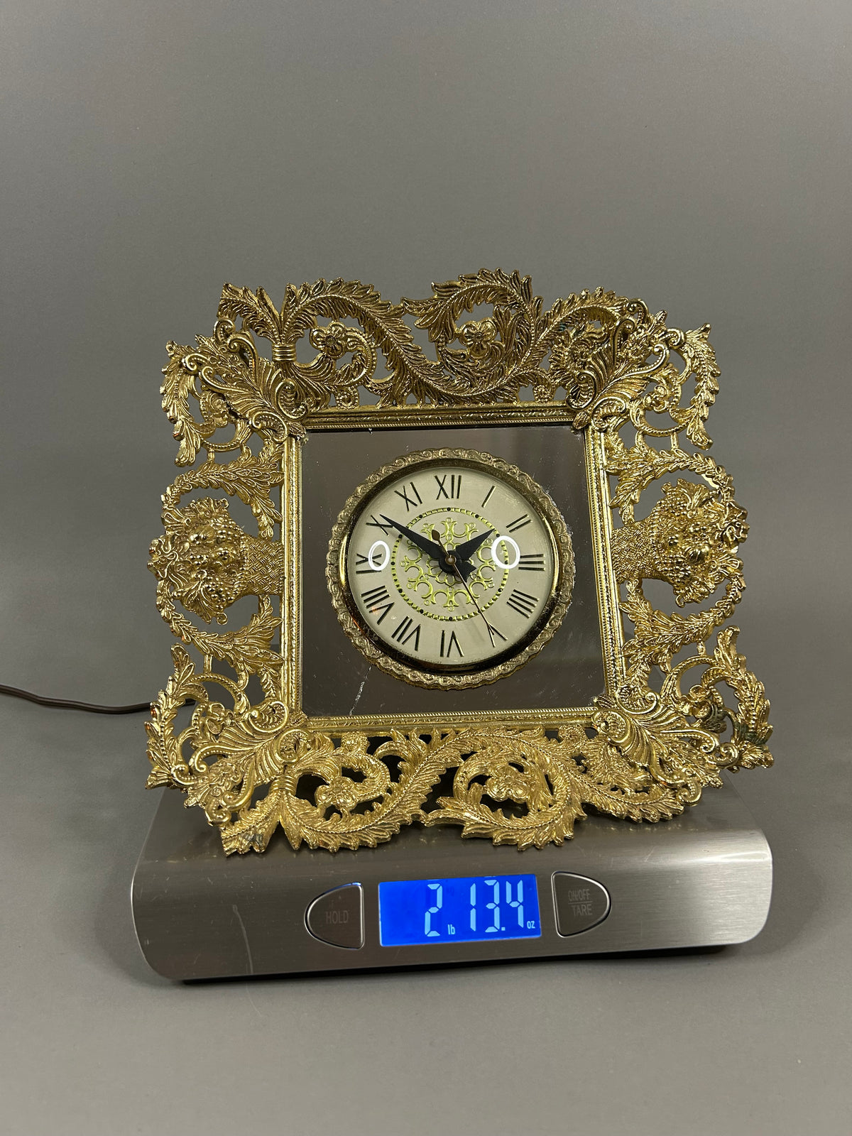 Movement by Landshire gold filigree mirror electric clock