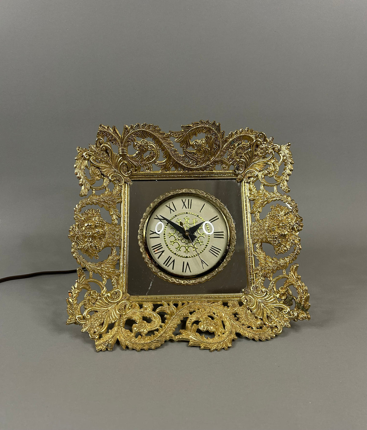 Movement by Landshire gold filigree mirror electric clock