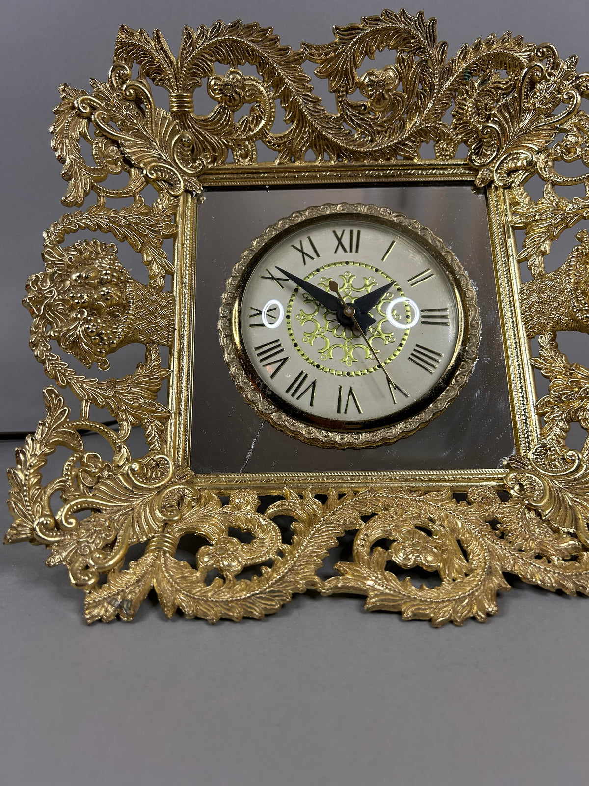 Movement by Landshire gold filigree mirror electric clock