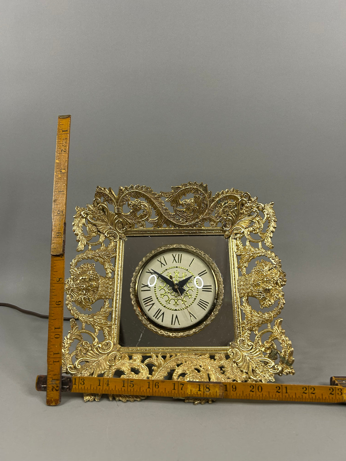 Movement by Landshire gold filigree mirror electric clock