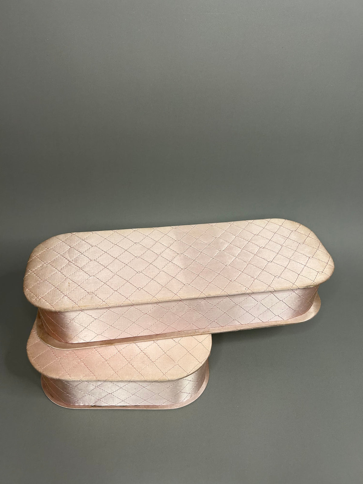 Set of powder pink quilt pattern stow cases