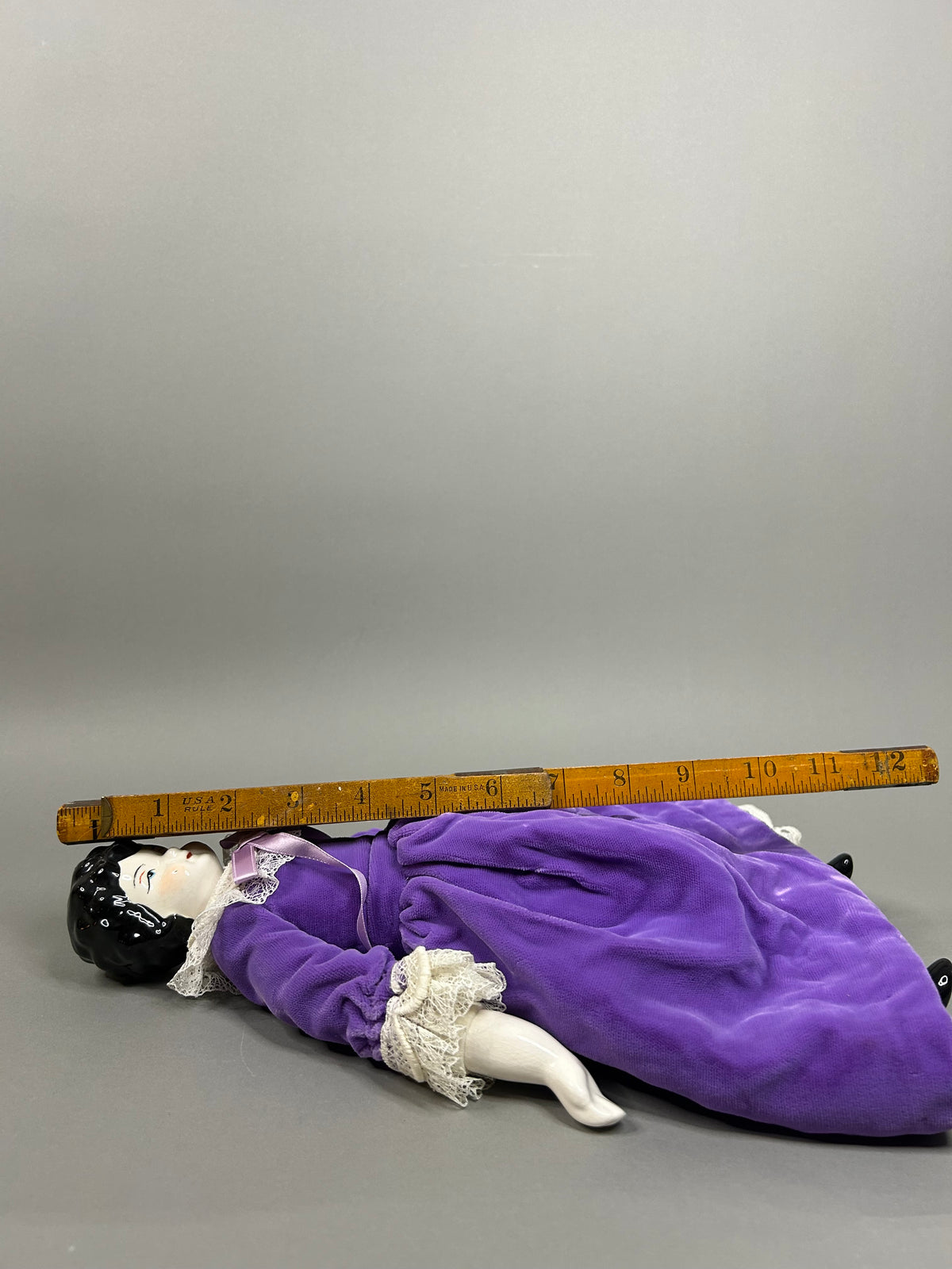 Porcelain head doll