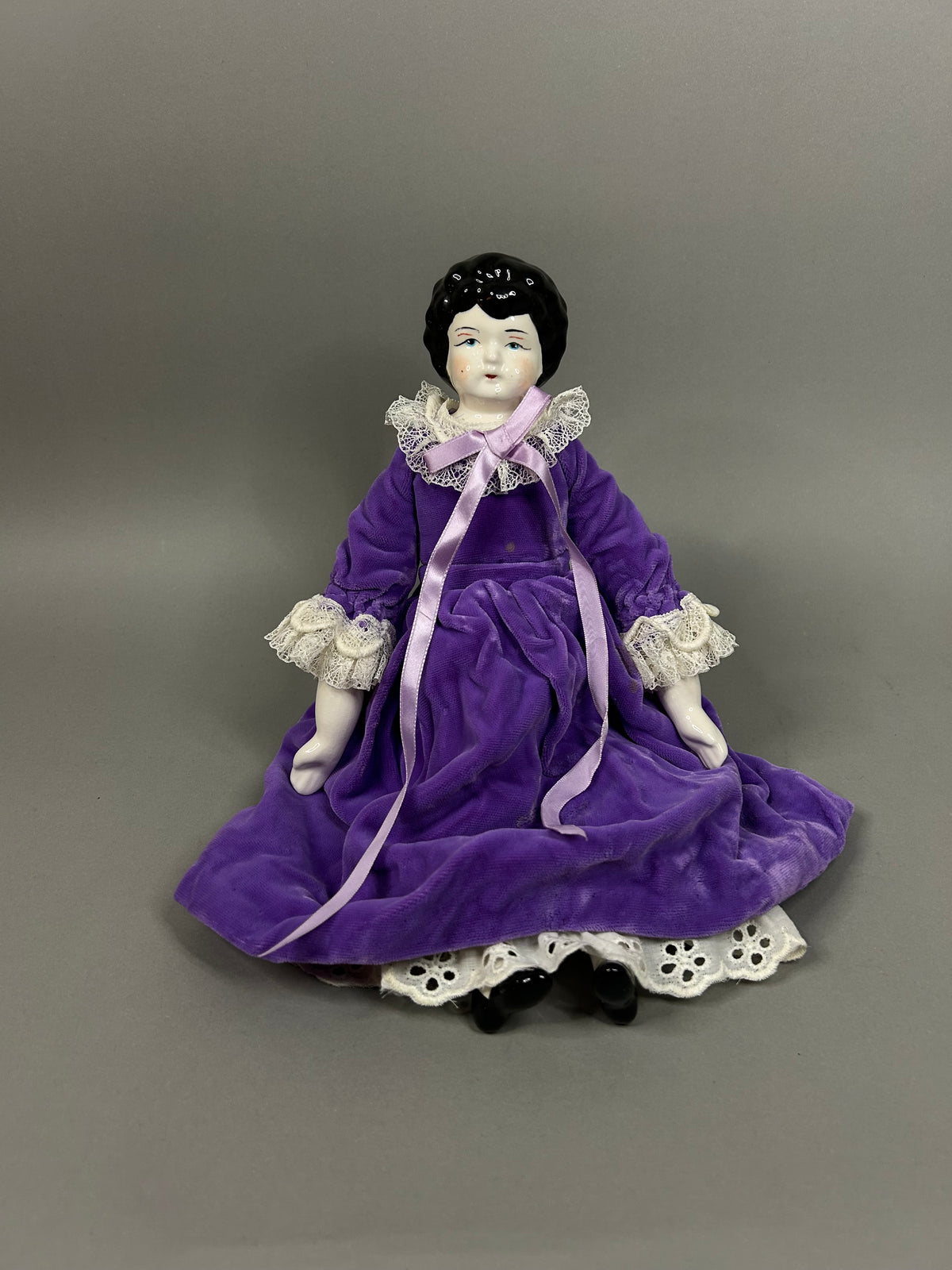 Porcelain head doll