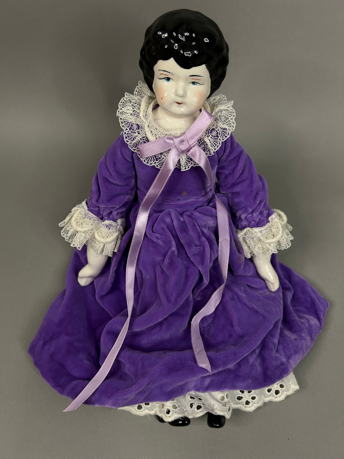 Porcelain head doll