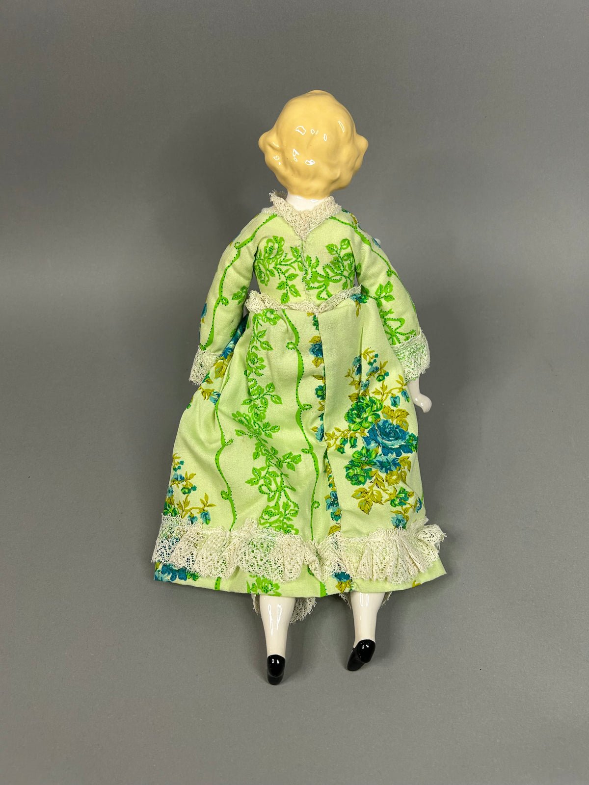 Blonde porcelain head doll