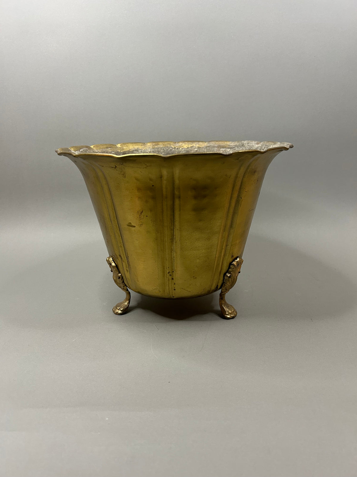 Brass footed planter
